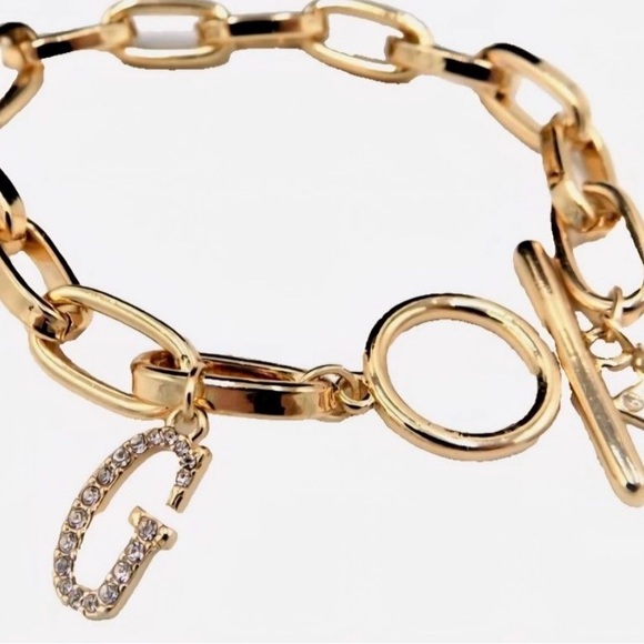 Guess Gold Tone Link Toggle Bracelet with Crystals - Picture 1 of 2